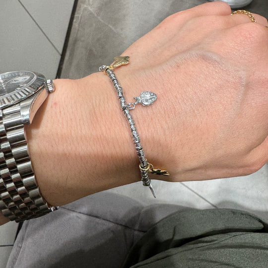 BRACCIALE DADINI E CIONDOLI DORATI