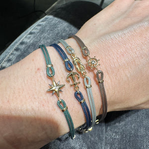 BRACCIALI CORDA E SIMBOLO IN ORO