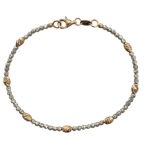 BRACCIALE PALLINE E OVALI DIAMANTATI IN ORO BIANCO E ROSA