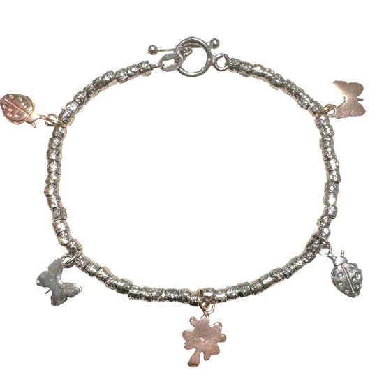 BRACCIALE DADINI E CIONDOLI ROSATI