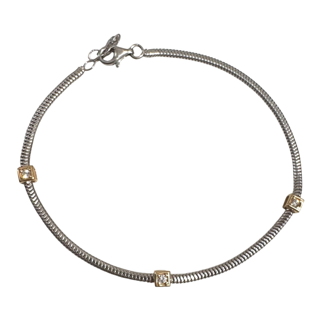 BRACCIALE IN ARGENTO CON TRE DADINI DORATI