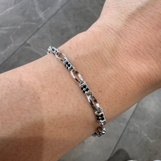 BRACCIALE IN ARGENTO CON PIETRE NERE