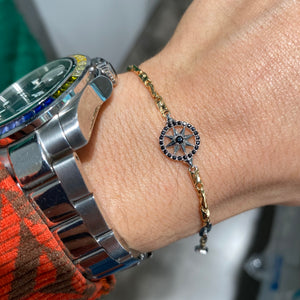 BRACCIALE ROSA DEI VENTI E ZIRCONI NERI IN ORO