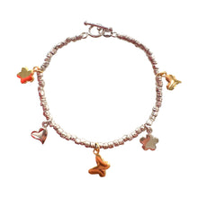 Carica l'immagine nel visualizzatore di Gallery, BRACCIALE DADINI E CIONDOLI DORATI
